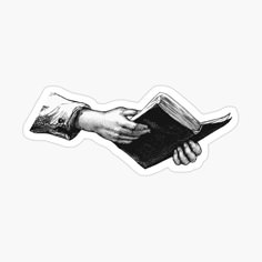 two hands holding an open book in black and white sticker on a white background