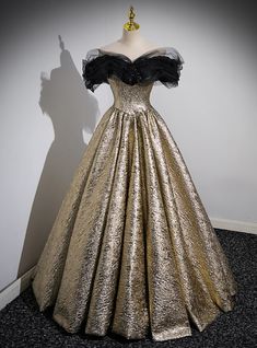 Command the room with celestial elegance in this golden prom dress, designed to make you the star of the evening. With its metallic sheen, the gown evokes the glamorous aura of a moonlit gala. This creation features a full, pleated ballgown skirt that fans out like rays of golden sunshine. Its corseted bodice is meticulously fitted to flatter your figure, while the off-the-shoulder tulle sleeves add a dreamy touch with their sheer, billowy design. At the heart of the bodice, a cluster of dark ro Satin Quinceanera Dress, Ballroom Prom, Golden Prom Dress, Contrast Drawing, Prom Dress Gold, Ballgown Skirt, Bridesmaid Dresses Dusty Sage, Flower Prom Dress, Tulle Neckline