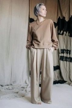 HI - very wide, high-waisted tencel pants. The trousers have two deep pleats on the front. Waist pulled with an elastic band only on the sides - the front and the back of the "belt" is smooth, so they look more favorably. Pockets in the side stitches. HI are very long. Probably they could be too long for some of you. It's easier to fix a leg too long, than a leg too short. Unfortunately, the wide leg and sleek fabric make them not suitable for hemming. So if they happen to be too long, the only Khaki Relaxed Fit Harem Pants For Work, Beige Relaxed Fit Harem Pants For Fall, Oversized Beige Pants For Spring, Beige Loosely Fitted Harem Pants For Work, Beige Harem Pants For Work, Relaxed Fit Beige Wide Leg Pants, Chic Beige Harem Pants With Elastic Waistband, Beige Wide Leg Harem Pants For Fall, Beige Harem Pants For Workwear In Spring