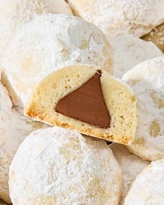 a close up view of some cookies with chocolate in the middle