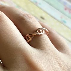 Rose Gold DNA Ring, Christmas Gift, Sterling Silver, Molecule Ring, Chemistry Jewelry, Gift For Doctor, Helix ring, Unisex Ring, Science Ring ♥MATERIALS ♥ High Quality Solid 925 Sterling Silver For solid gold pieces we use 14k real solid gold ♥FINISH♥ Silver- Gold- Rose Gold ♥ SIZE ♥ US5-US5.5-US6-US6.5-US7-US7.5-US8-US8.5-US9-US9.5-US10 ♥ How to customize Order? ♥ 1) Select Finish 2) Select ring size 3) Click "Add to Cart" 4) Please write the date to the text box.  5) Checkout 6) Complete order Dna Ring, Dna Necklace, Chemistry Jewelry, Dna Jewelry, Spiral Jewelry, Helix Ring, Gift For Doctor, Petite Ring, Tungsten Carbide Wedding Bands