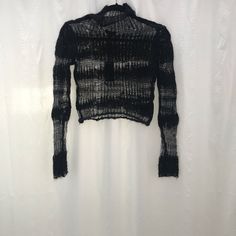 Nwt. Open Knit Sweater. Mock Neck. Metallic Thread Detail. Cropped Fit. Made From Wool/Alpaca/Polyamide/Polyester/Metallic Thread. Us Shipping Only. All Sales Final. Bust 15” Length 16” Sleeve Length 24” Shoulder 14” Fitted Pointelle Knit Sweater For Layering, Black Crew Neck Fine Knit Cardigan, Fitted Turtleneck Cardigan With Textured Knit, Edgy Cropped Tops For Winter, Long Sleeve Pointelle Knit Tops For Night Out, Black Knit Crew Neck Top, Black Fine Knit Cropped Sweater For Fall, Pointelle Knit Tops For Night Out In Fall, Fitted Open Knit Sweater For Layering