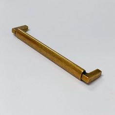 an old brass door handle on a white background