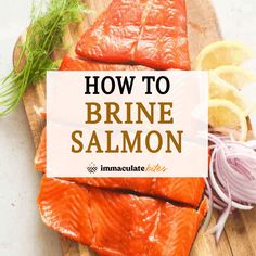 how to brine salmon on a wooden cutting board with onions, lemons and herbs