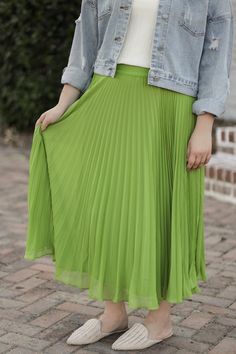 The Chasity Pleated Skirt has such an elegant style! This midi length skirt is fully lined and is detailed with accordion pleats. This flowy, fun skirt is perfect to jazz up your style! - Elastic waistband - Accordion-style pleats - Midi length - Fully lined - Material: Self: 100% Polyester | Lining: 100% Polyester - Model is wearing a small Color Disclaimer: Actual colors may vary due to computer monitors. *Measurements are taken flat, and then doubled.* Size Waist Length Small 25" 32" Medium 2 Flowy A-line Maxi Skirt With Accordion Pleats, Flowy Midi-length Pleated Skirt With Lining, Solid A-line Skirt With Accordion Pleats, Relaxed Midi-length Pleated Skirt With Lining, Spring Midi-length Accordion Pleats Skirt, Skirts For Kids, Boys Denim, Shoes Sandals Heels, Midi Length Skirts