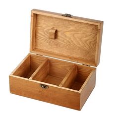 an open wooden box with four compartments