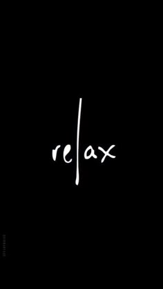 the word relax is written in white ink on a black background with an arrow pointing to it