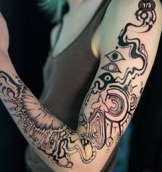 a woman with a tattoo on her arm