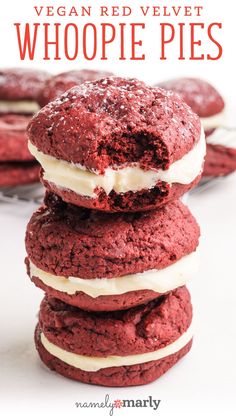 vegan red velvet whoopie pies stacked up on top of each other