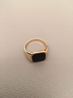 "Signet ring with Black square Onyx Seal Suitable for women and men Onyx size is 12X14 mm Made of 18K gold plated OR sterling silver set with squarq onyx stone Please note in the \"notes to seller\" at checkout. your ring size The product will arrive to you packed in gift box and padded envelope to maintain the product Thank you for your interest. Please check out our other items and be sure to add us to your favorites! https://www.etsy.com/shop/Limajewelry We look forward to the opportunity of Minimalist Black Engraved Promise Ring, Black Rectangular Signet Ring For Anniversary, Black 14k Gold Open Signet Ring, Classic Black Engraved Promise Ring, Black Rectangular Anniversary Ring, Minimalist Black Signet Promise Ring, Black Rectangular Ring Gift, Black Rectangular Rings For Gifts, Black Rectangular Signet Ring For Formal Occasions