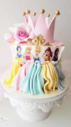 there is a cake that has princesses on it