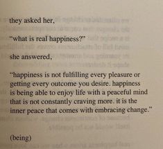 an open book with some writing on the page and a quote about happiness in it