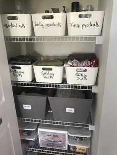 an organized pantry with bins and baskets