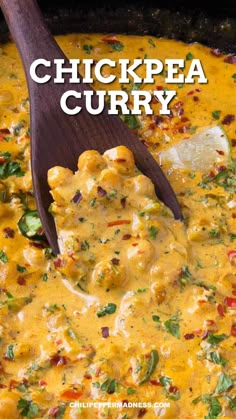 chicken curry in a skillet with a wooden spoon and text overlay that reads, chickpea curry