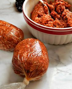 an image of some food that is in the bowl on the kitchen counter with it's ingredients