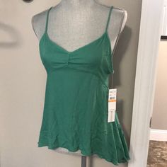 Green Gauzy Like Material Tank Top With Low Back And Cross Strap Detail. Super Cute! Nwt Size S Slightly Longer In Back. Casual Tops With Built-in Bra For Beach Season, Green Vacation Top With Built-in Bra, Casual Triangle Top For Loungewear, Casual Camisole Top For Beach Season, Stretch Cami Top For Beach Season, Fitted Casual Camisole For Beach Season, Green Casual Camisole For Vacation, Casual Green Camisole For Vacation, Green Tank Camisole For Beach