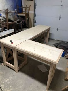 a wooden table being built in a garage