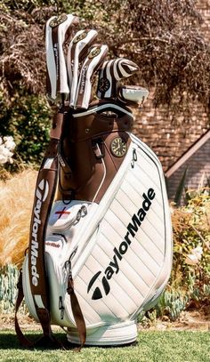 a close up of a golf bag on the grass