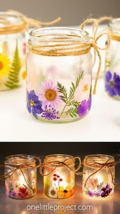 mason jars with flowers painted on them and tied in twine