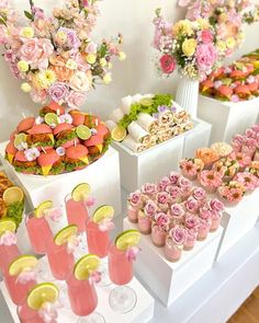 a table topped with lots of different types of desserts