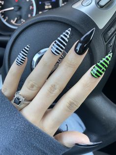 Spooky Oval Nails, Almond Acrylic Halloween Nails, Pointy Halloween Nails, Beetlejuice Nails Acrylic, Beetlejuice Nail Designs, Gothic Almond Nails, Beetle Juice Nails, Green Halloween Nails, Beetlejuice Nails