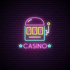 neon casino sign with slot machine on brick wall background