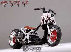 a white and red motorcycle with flames painted on it