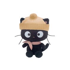 a black cat stuffed animal with a hat and scarf on it's head, sitting in front of a white background