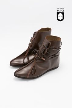 These Viking half boots are made from leather and feature a complex closure for a secure fit. This consists of two flaps and a knot at the front of the shoe for a secure fit as well as a stylish appearance. These are perfect for reenactments or historically inspired character concepts. Color: Dark Brown Includes Sole Triquetra Pendant, Viking Shoes, Paracord Armband, Half Boots, Ragnar Lothbrok, Black Week, Viking Jewelry, Bushcraft, Paracord