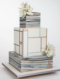 an instagram page with a stack of boxes and flowers on it, which reads instagram