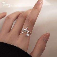 Add a touch of celestial elegance to your look with the Thaya Silver Stars Ring. This adjustable open ring is made of 925 silver and features a stunning pattern of stars, sun, moon, clouds, and universe. Suitable for women with US size 6-7 (inner diameter about 16.5-17.3mm), this ring is perfect for any occasion. Shop now and adorn yourself with the beauty of the cosmos. Silver Moon Ring, Stars Ring, Fantasy Ring, Moon Clouds, Moon And Star Ring, Moon Ring, Natural Home Decor, Silver Moon, Star Ring