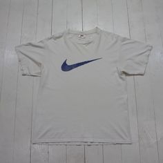 1990s Nike Big Swoosh T-Shirt Made in USA Size M condition - good - light distressing - very light discolouration tagged M 20.5" pit to pit  27.25" length Please contact us if you have more questions about this garment. Shirt Nike, Made In Usa, Gender Neutral, Art Collection, Bathing Beauties, Adult Outfits, Display Homes, T-shirt, Tops & Tees