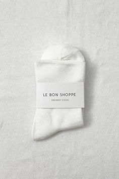 Le Bon Shoppe sneaker socks. Going from workout to work? Prefer to be barefoot? Sneaker Socks are a breathable sock that you can sweat, dance, jump and play in without leaving a mark on your skin like most sock bands do! She is our improved take on a simple everyday sock that you can count on. The perfect height made from an airy cotton blend yarn she is found in a wide assortment of neutral and bright colors. 70% cotton, 28% polyester 2% spandex One size fits most Machine wash cold, tumble dry Cottage Socks, Sneaker Socks, Winter Sparkle, 2024 Wishlist, Usa Tee, Sock Sneakers, Diffuser Jewelry, Socks Sneakers, Heavy Knit