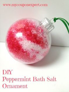 a pink and white ornament with glitter on it