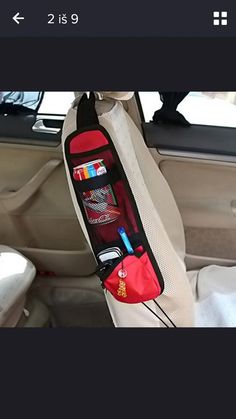 the back seat pocket is filled with various items