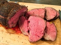 the meat is cut up and ready to be served on the cutting board for consumption