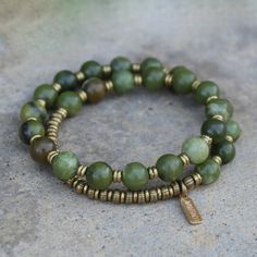 Jade Mala Bracelet. Genuine green jade bracelet for good luck. Made with genuine jade gemstones. Brass hand made beads support women in Africa. Contains 27 beads so its a wrist mala! Stringed on our signature and exclusive thick hitec elastic. Made in the USA. Jade is said to bring harmony to the wearer and to attract prosperity and abundance. Jade Mala, Green Jade Bracelet, Women In Africa, Prosperity And Abundance, Aromatherapy Bracelet, Wrist Mala, Support Women, For Good Luck, Chakra Jewelry