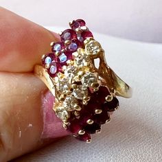 Fabulous Vintage Ring In Solid 14k Yellow Gold (Stamped And Also Tested). Ring Is Size 5.25 On Ring Mandrel, Weights 4.6 Grams. With Vibrant Genuine Rubies And Diamonds. I Do Not Have An Info On Stones, But They Are Absolutely Genuine. There Are 16 Round Cut Rubies And 8 Round Cut Bright Diamonds ! Rubies Are Super Vibrant & Diamonds Are Eye Clean, Sparkly White!!! Very Beautiful Cocktail Ring !!! 14k Stamped Cluster Jewelry For Anniversary, Classic Red Cluster Diamond Ring, Classic Red Cluster Ruby Ring, Classic Red Ruby Cluster Ring, Elegant Red Cluster Diamond Ring, Fine Jewelry Red Diamond Ring Stamped 14k, Red Cluster Ring Stamped 14k, Red 14k Stamped Cluster Ring, Vintage Diamond Ruby Ring