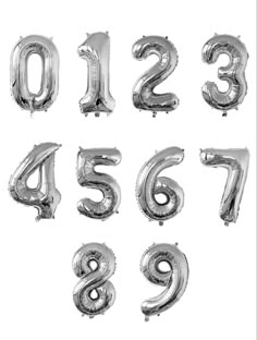 silver foil balloons in the shape of numbers and numerals on a white background