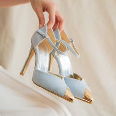 Blue Suede Women's High Heels with Gold Detailing Wedding Shoes (11cm Heel) Step into sophistication on your special day with our blue Suede Women's High Heels with Gold Detailing. These exquisite wedding shoes combine luxury and comfort, making them the perfect choice for brides and guests alike. Key Features: Elegant Design: The sleek blue suede finish is beautifully complemented by stunning gold detailing, adding a touch of glamour to any wedding ensemble. Perfect Heel Height: With a heel height of 11cm, these shoes create a striking silhouette while providing a confident lift that elongates your legs. Comfort-Focused: Designed with a cushioned insole, these heels offer all-day comfort, allowing you to enjoy every moment--from walking down the aisle to dancing the night away. Versatile Perfect Heels, Womens Wedding Shoes, Walking Down The Aisle, Blue Suede, Gold Details, Womens High Heels, Wedding Shoes, Wedding Shoe, Elegant Design