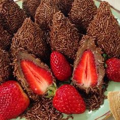 chocolate covered strawberries are arranged on a plate