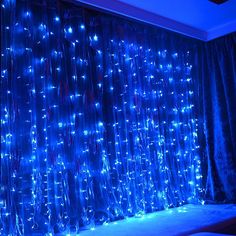 the curtains are covered with blue lights