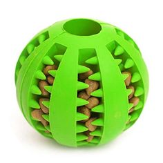 a green ball with holes in it on a white background