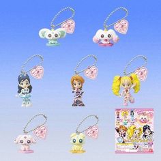 littlest pet shop keychains are shown in various colors and designs, including one with