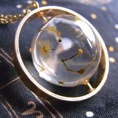 Handmade resin galaxy necklace! The outer ring can rotate 💫 Available on my Etsy store (Link in bio) #resin #resinart #resinjewelry #resinjewellery #handmadejewelery #handmadejewellery #resinpendant #resincharms #handcrafted #handcraftedjewelry #constellations #goldjewellery #goldjewelry #daintyjewelry #starryskynecklace #starmap #etsy #etsyshop #celestial #astrology #celestialjewelry #minimalisticjewelry #goldnecklace #レジン #アクセサリー #ハンドメイド #gold #giftideas #constellationnecklace #zodiacjewelry Resin Galaxy, Galaxy Necklace, Astrology Necklace, Constellation Necklace, Zodiac Jewelry, Celestial Jewelry, Resin Pendant, Rose Gold Necklace