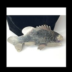 "You Are Looking To Buy: Vintage Etched Silver Salmon Fish BELT BUCKLE 3.75\" Hand Made Dean Cook Jack Holder 1978 - New Condition without Price Tags! Details: On Back Inscription Reads: \"Hand Crafted by Dean Cook\" and \"Jack Holder 1978\" Size: 3.75\" Wide x 1.25\" High.  Holds Belts Up To 1.75\" Wide Good Condition With Wear On Silver Great Gift for Him or Her - or For Yourself! Thank You! We will ship your order immediately upon receipt of payment. For your convenience, we do combine shippi Fish Belt, Salmon Fish, Price Tags, Suspender Belt, Price Tag, Buy Vintage, Belt Buckle, Suspenders, Belt Buckles