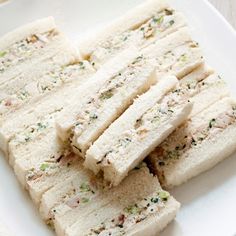 several pieces of food on a white plate