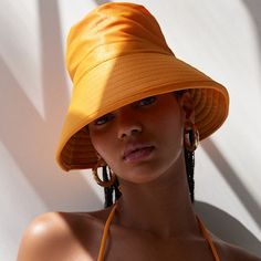 New With Tag. Oversized Bucket Hat With An Allover Metallic Shimmer. Ribbed Wide Brim Perfect For Keeping You Cool On Sunny Days. - 85% Polyester, 15% Spandex - Spot Clean Orange Wide Brim Sun Hat For Spring, Orange Summer Outdoor Hat, Trendy Yellow Bucket Hat For Spring, Urban Outfitters Hats With Adjustable Fit And Short Brim, Urban Outfitters Adjustable Hat With Short Brim, Urban Outfitters Adjustable Short Brim Hat, Urban Outfitters Curved Brim Hat For Spring, Retro Wide Brim Sun Hat For Summer, Orange Wide Brim Sun Hat