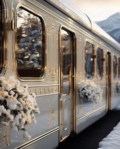 a train is decorated with flowers and snow