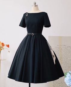 Beautiful vintage style dress. Comes with broach, gloves, and belt made with same material as the dress. Material: Dress - 88% Nylon, 12% spandex. Lining - 96% Polyester, 4% spandex. Sizes: Xsmall - bust 80cm, waist 62cm, length 102cm  Small - bust 84cm, waist 66cm , length 103cm Medium - bust 88cm, waist 70cm, length 103cm  Large - bust 92cm, waist 74cm, length 104cm  Xlarge -bust 96cm, waist 78cm, length 105cm  Hello and welcome to my shop! I am new to Etsy but not to this business. All our dresses are handmade with high quality fabrics by skilled tailors. Rest assured, the dress you see in the picture is the dress that you will receive. Our dresses are priced very competitively to bring you the best value. About Size All sizes listed are external sizes of the clothing, not what your bod Audrey Hepburn Black Dress, Vintage Dresses Victorian, Elegant Bridal Dress, Audrey Hepburn Inspired, Vintage Tea Dress, Vintage Black Dress, Mid Calf Dresses, Boho Wedding Dress Lace, Vintage Style Dresses